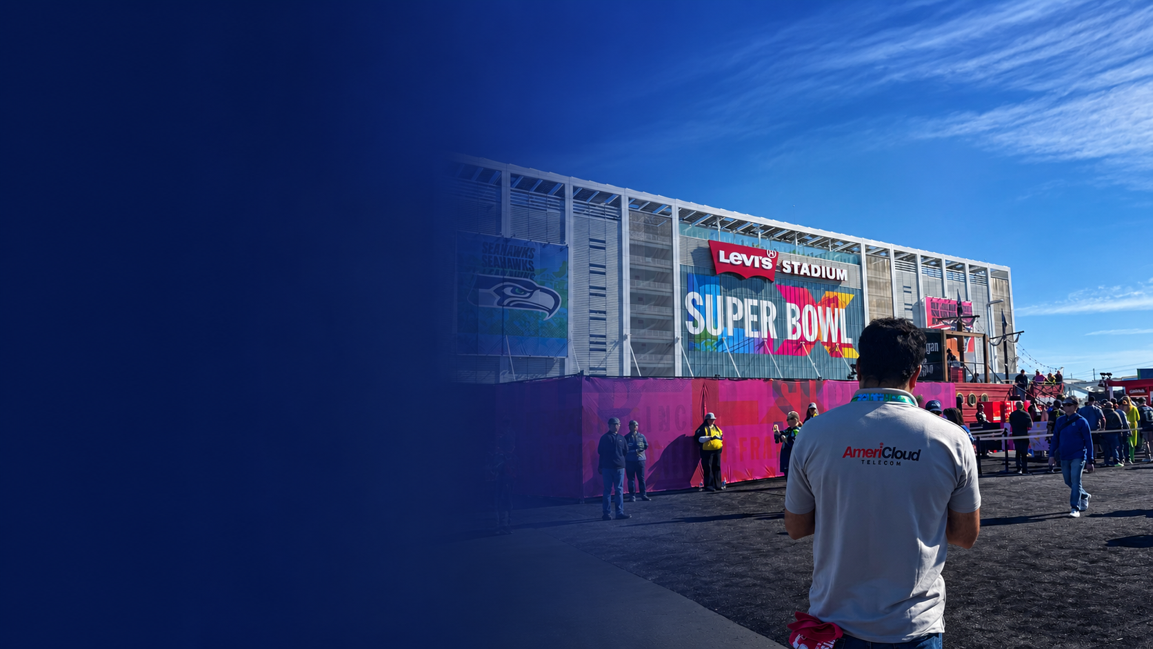 AmeriCloud staffer in front of Levi's Stadium at Super Bowl