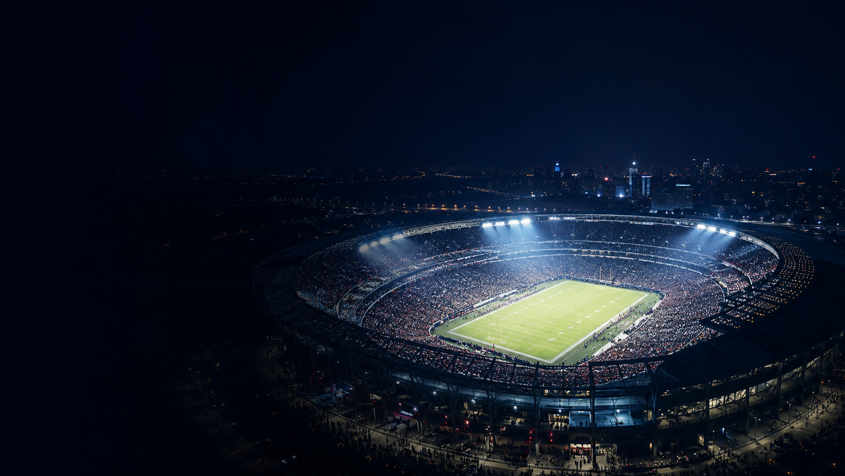 Packed stadium at night during a major event, viewed from above
